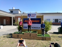 Riksu mitali kaulassa